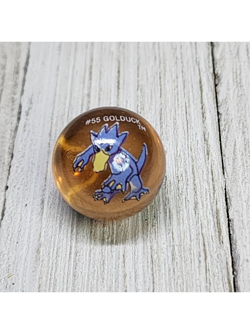 Vintage Pokemon #55 Golduck Marble Clear Orange Glass Toy Biz Collectible